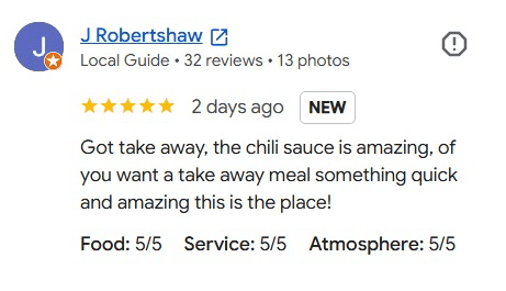 Google review by J Robertshaw, five stars: “Got take away, the chilli sauce is amazing, if you want a take away meal something quick and amazing this is the place!” Food, service and atmosphere each rated 5/5.